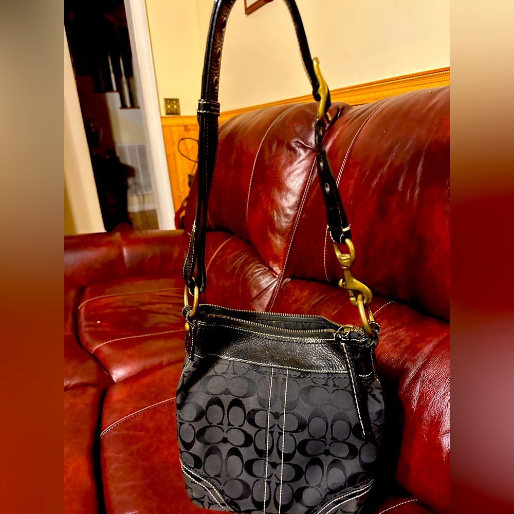 A Coach Crossbody black w black leather strap brass finish 🪝 black fabric Coach